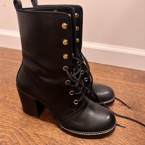 Stuart Weitzman Black Lace-Up Boots with Gold Accents
